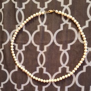Elegant White Freshwarer Pearl Necklace With 14 Carat Gold Clasp